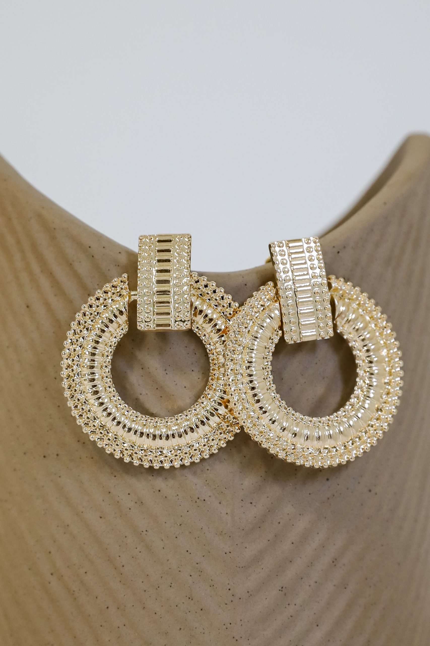 shopdressup_gold_circle_statement_earrings-4.jpg